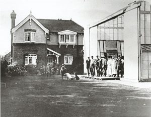 Photograph of James Williamson sat outside his studio in Hove, MF000302