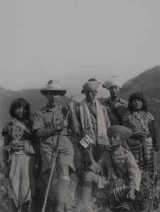 James Henry Green (second from left) accompanied by Burmese soldiers and women, c1926
