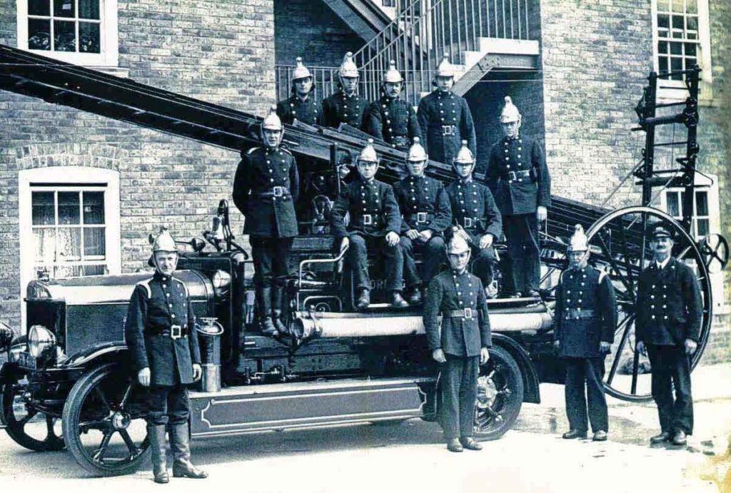 Members of Hove Fire Brigade with the vehicle PN 4119, c1930.