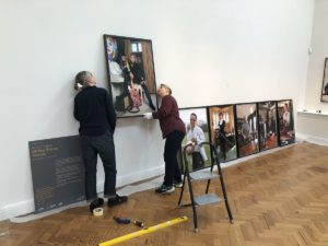 Installation of 100 First Women Portraits at Brighton Museum