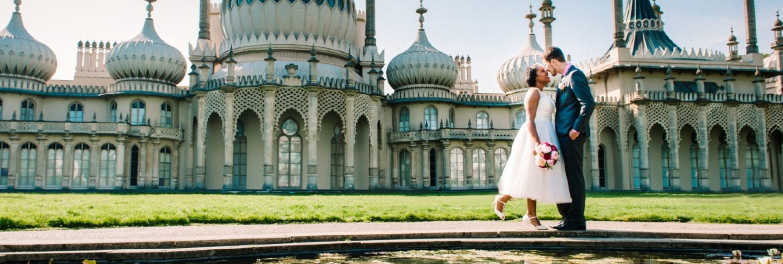 A wedding couple outside the Royal Pavilion.