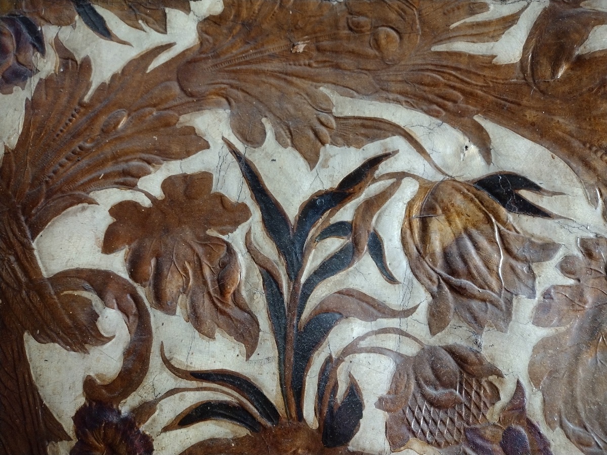 Detail of leather wallpaper in Cleves Room.