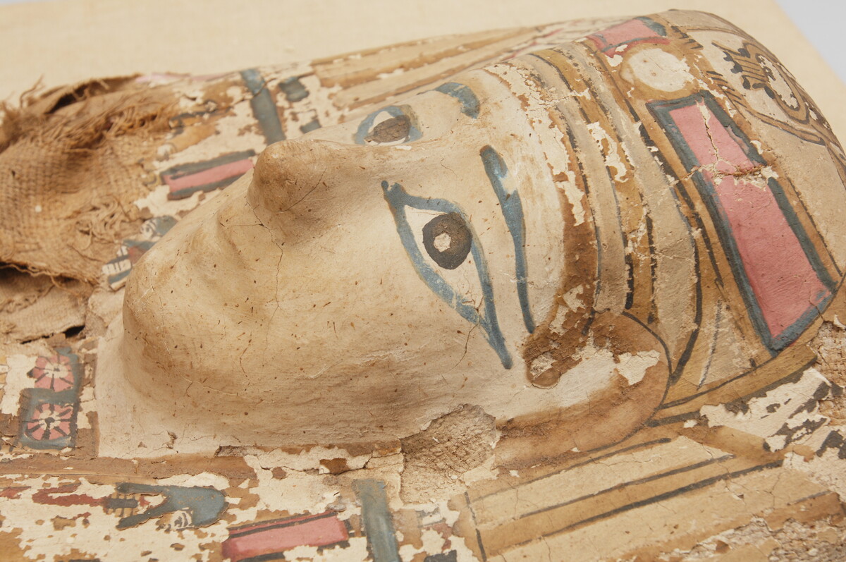 Face on Ancient Egyptian sarcophagus.