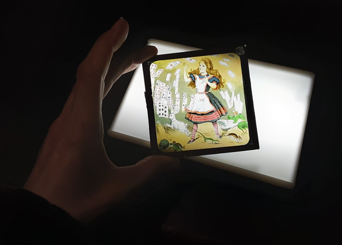 Magic lantern slide featuring Alice in Wonderland