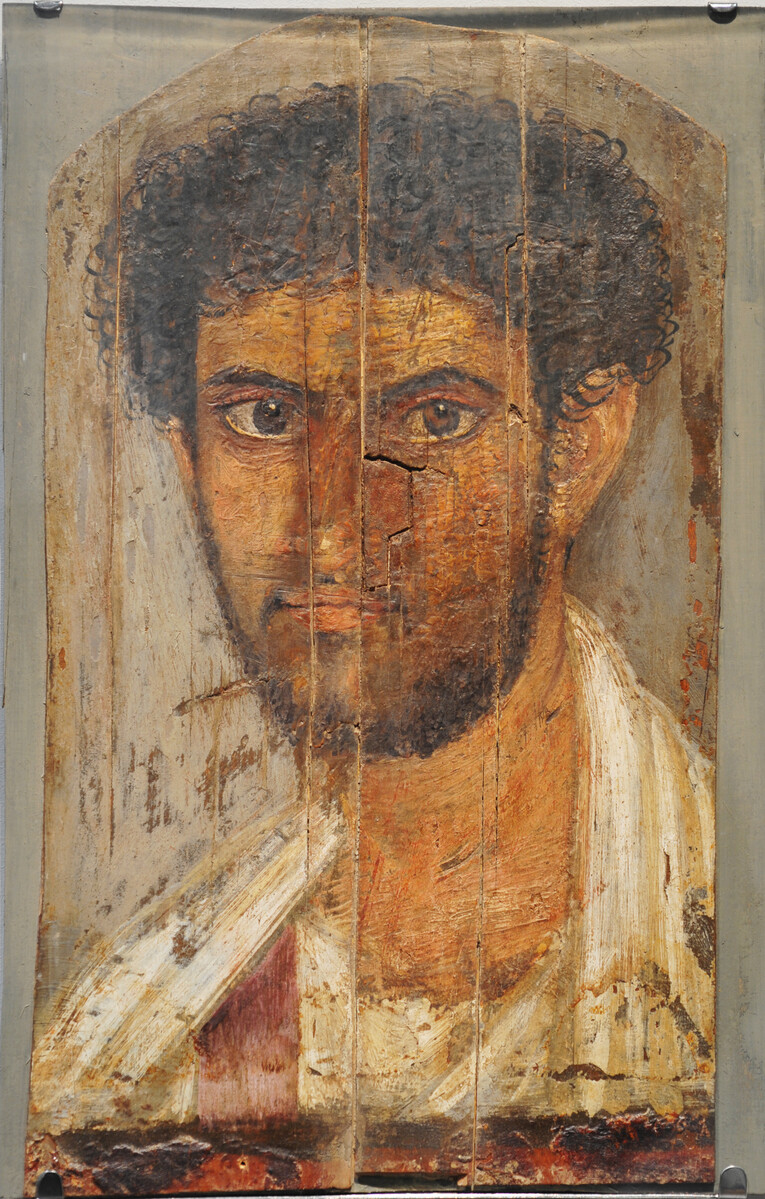 A portrait mask which was found fixed over the face of a mummified body in the Roman cemetery at Hawara in Egypt.