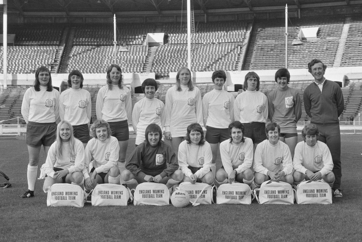 The England women's national football team and their manager, Eric Worthington, line-up for a team portrait at Wembley Stadium in London, England, 15th November 1972. (Photo by Ronald Dumont/Daily Express/Hulton Archive/Getty Images)