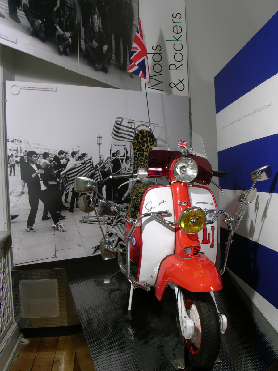 Scooter on display in a museum.