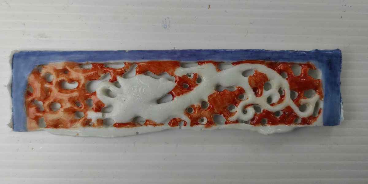 Test sample of blue and red colour on Hextal epoxy resin reconstruction