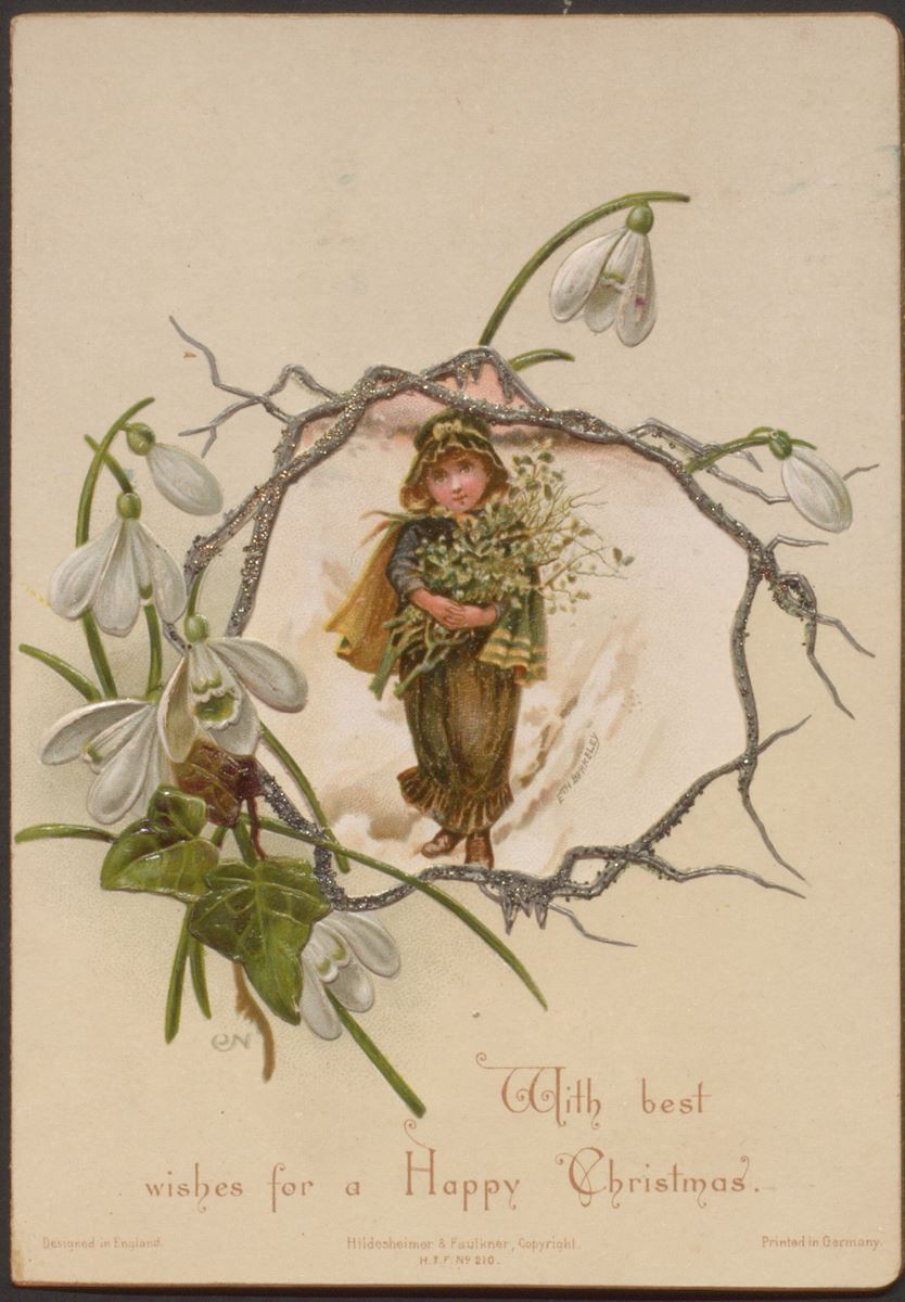 This image depicts an old Christmas postcard featuring a wreath composed of snowdrops and English ivy. Positioned within the wreath a child is seen holding a bunch of greenery.