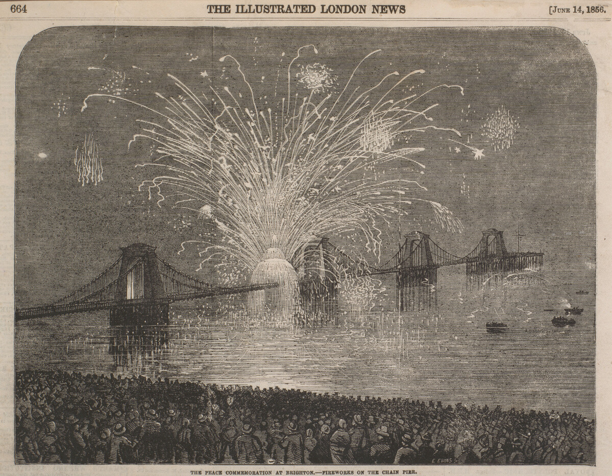 The Peace Commemoration at Brighton - Fireworks on the Chain Pier. From the Illustrated London News 14 June 1856 a firework display on the Chain Pier to commemorate peace after the Crimean War. Thousands of people stand on the front to see the fireworks and some small boats on the west side of the pier are full of people.