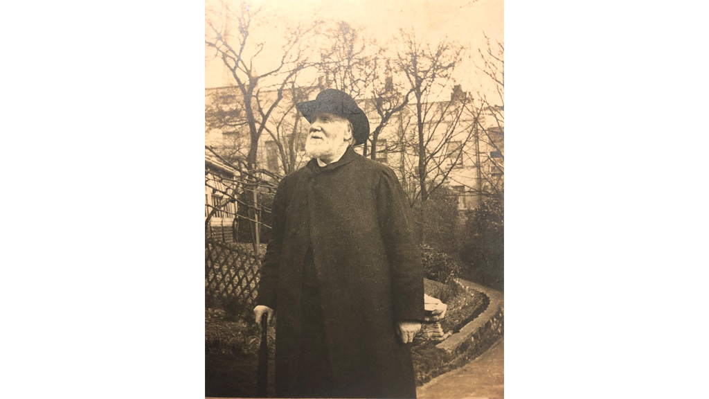 Photograph of Henry Willett taken in 1903. Probably taken in the garden of Henry Willett's home, Arnold House, in Upper North Street, Brighton