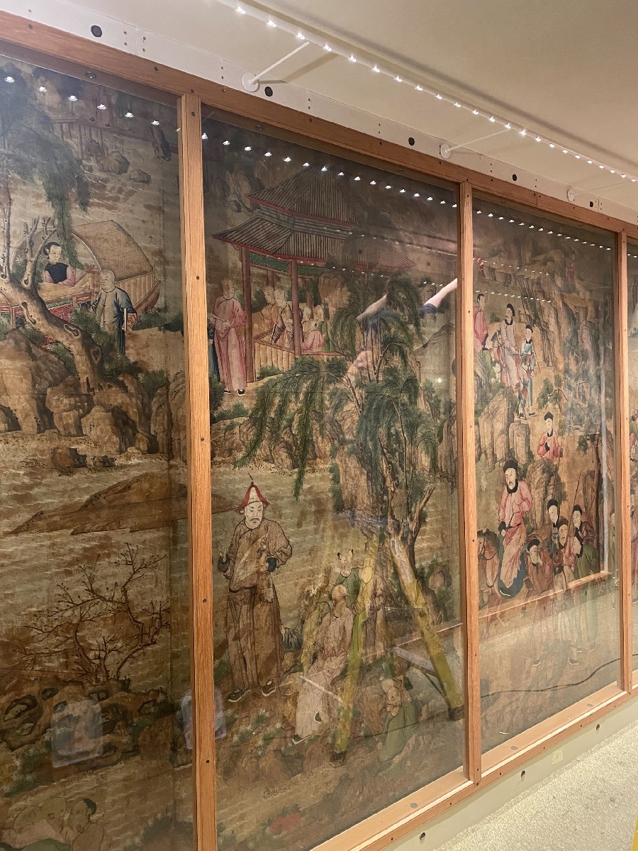 The Chinese wallpaper is illuminated in the Adelaide corridor