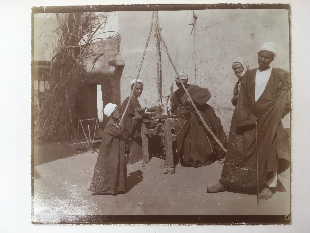 Cairo scene with four men photographed by the Thomas-Stanfords of Preston Manor in 1901