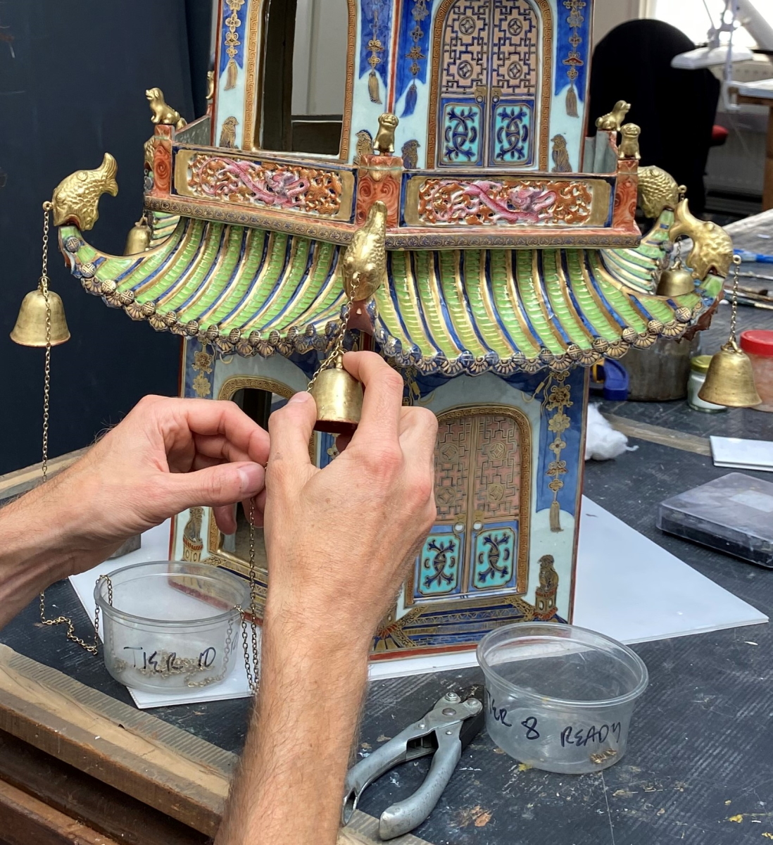 Above: Bells being hung and chain link positions checked