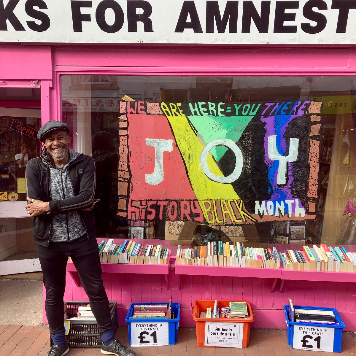 JOY window dressing for Amnesty book store, 2023