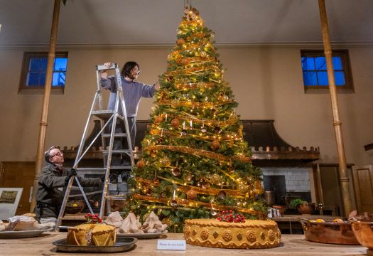 B&HM staff put finishing touches to Christmas tree in Great Kitchen, Royal Pavilion