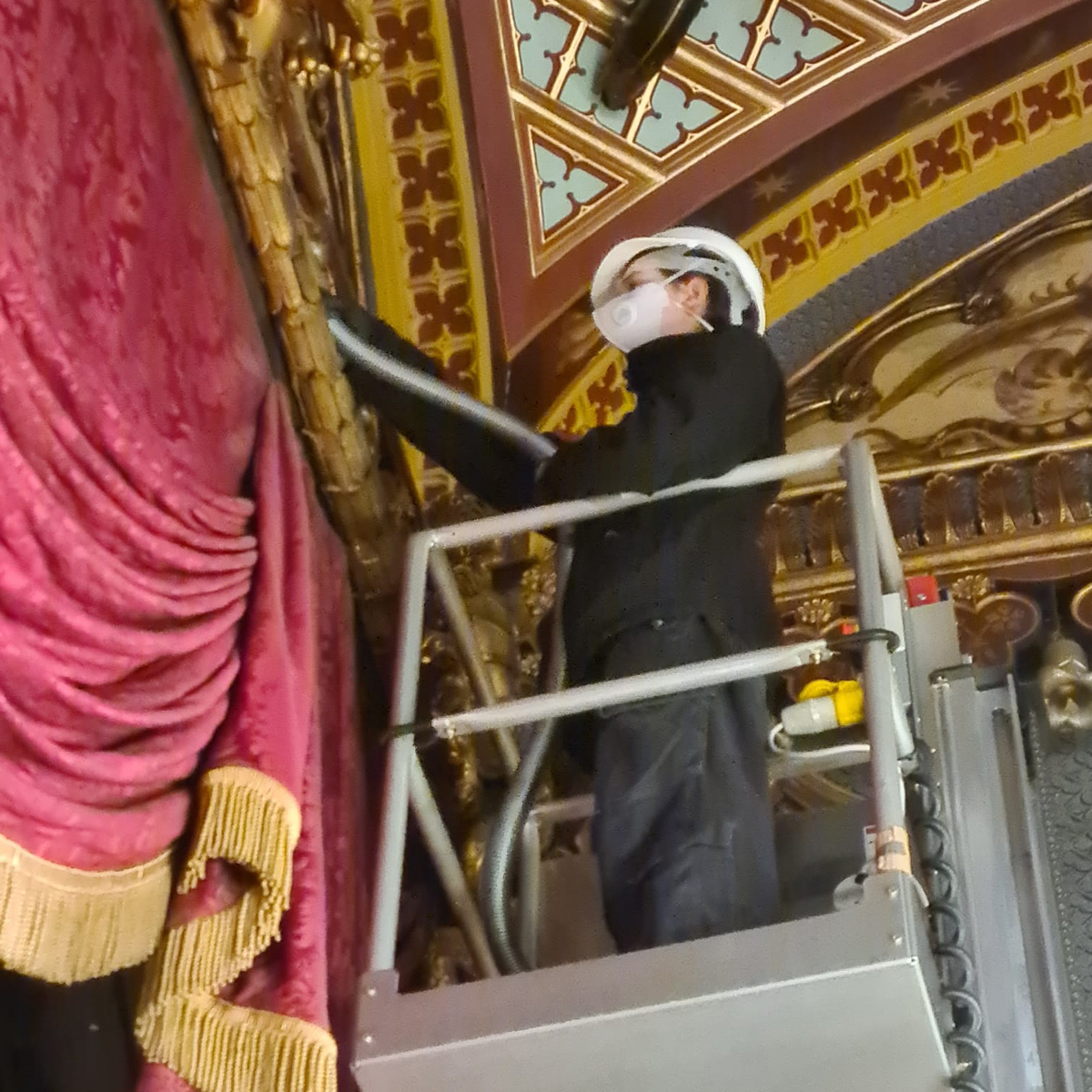 Conservation team on the scaffolding tower in the Banqueting Room