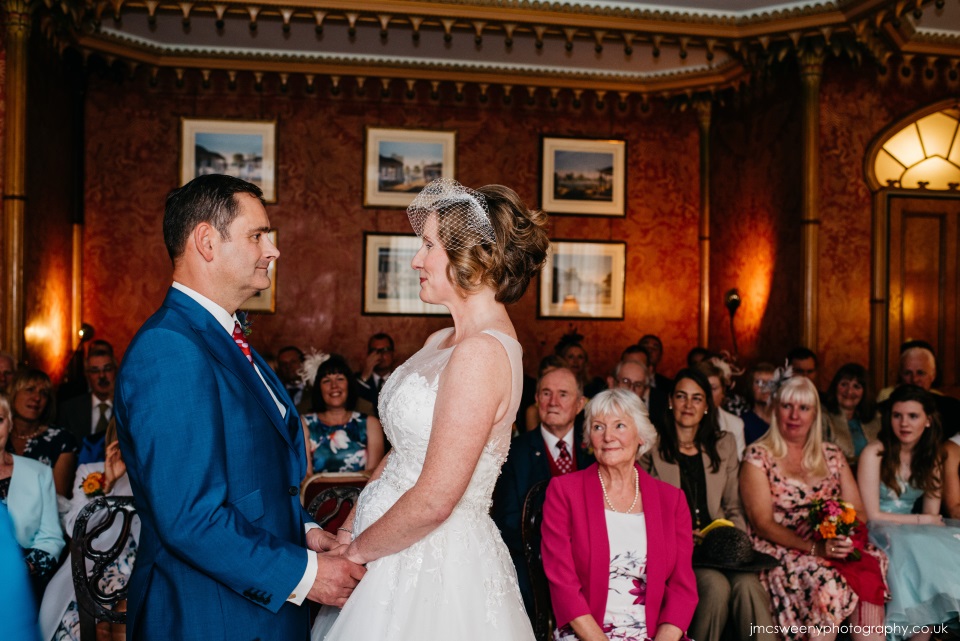 A wedding ceremony in the Red Drawing Room