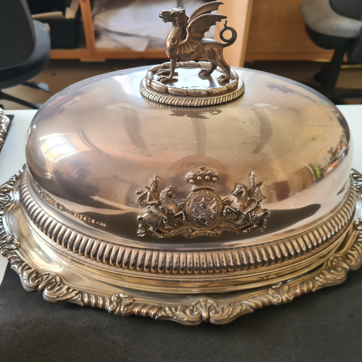 Tarnished silver with various different shapes to test cleaning methods