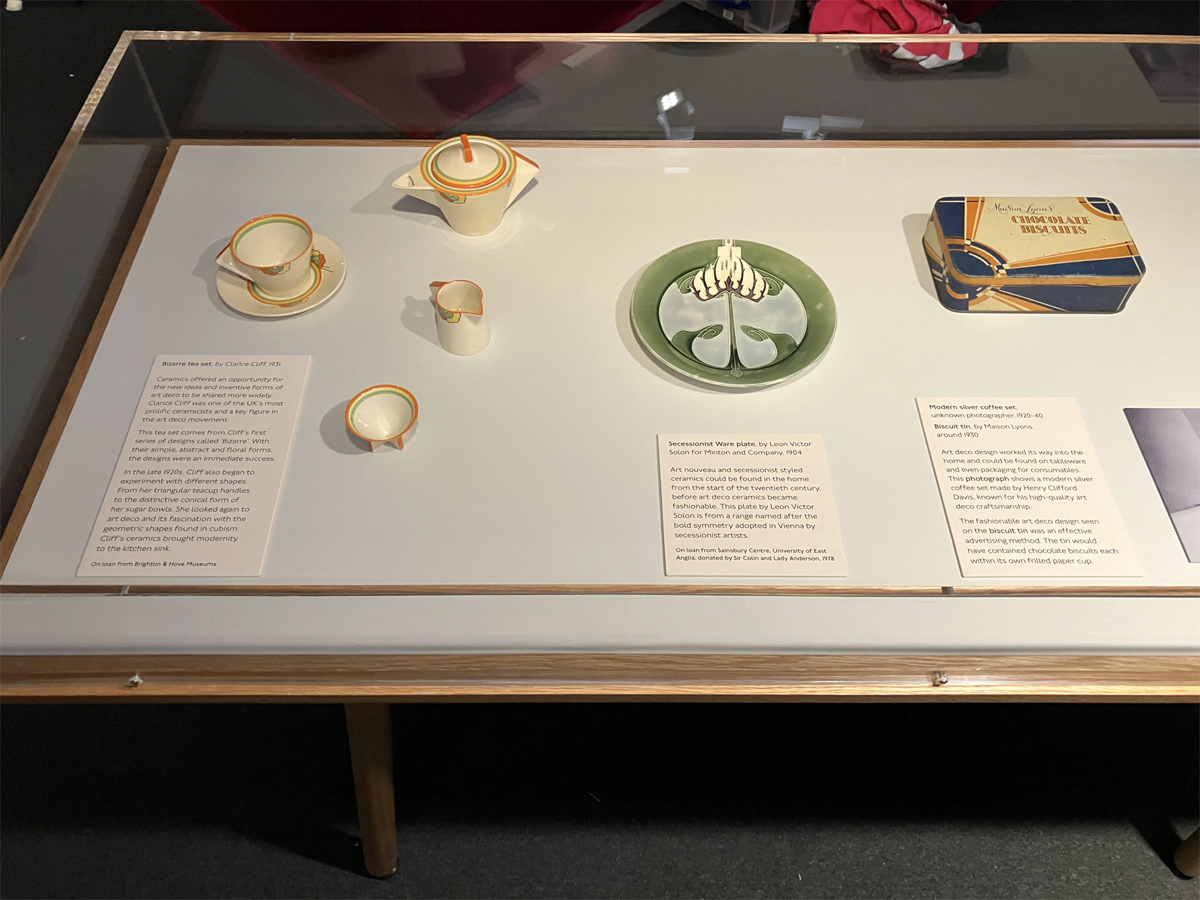 Our French Paper Fans and Clarice Cliff/ A.J. Wilkinson tea set in the Art Deco: the Golden Age of Poster Design exhibition at the London Transport Museum