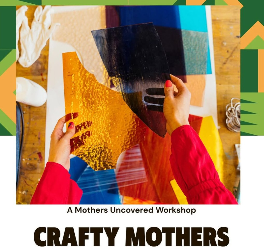 Mothers Uncovered Presents: Crafty Mothers. A woman's hands hold different colour craft paper for the workshop.