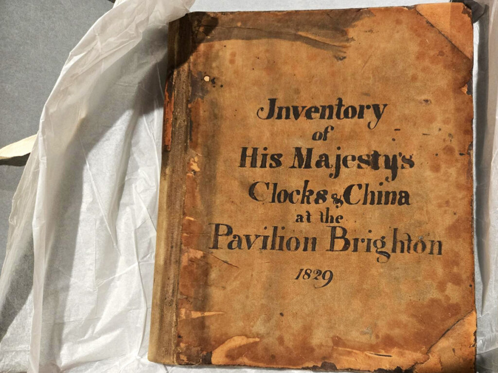 Inventory of His Majesty's Clocks. An aged bound volume with hand written title: Inventory of His Majesty's Clocks & China at the PAvilion Brighton 1829
