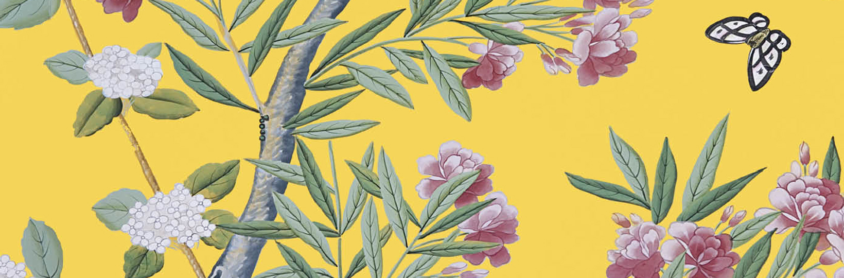 Royal Pavilion Queen Victoria's Bedroom Wallpaper. A bright yellow background with a branch growing up. There are pink and white flowers and a white and black butterfly