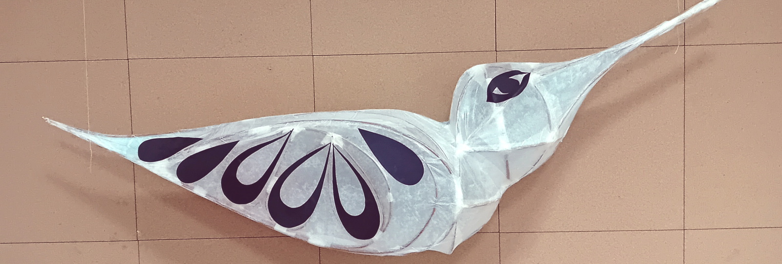 Photograph of a willow sculpture of a white bird