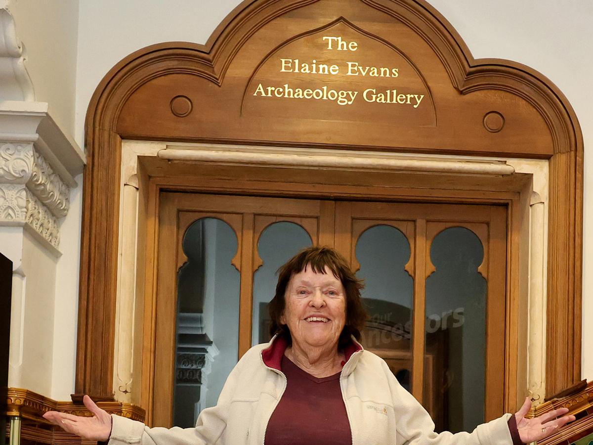 Elaine Evans standing outside the Elaine Evans Archaeology Gallery