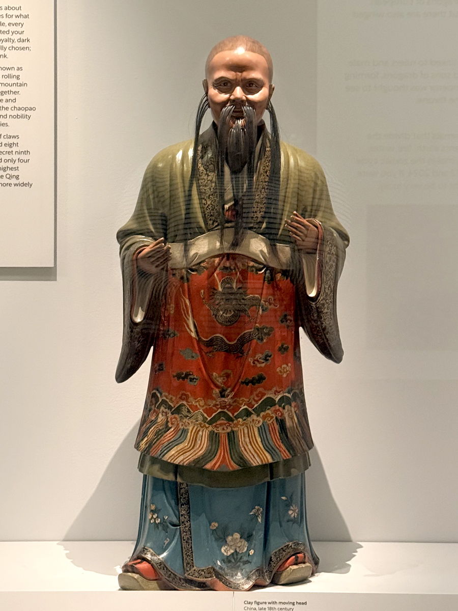 Clay figure with moving head, China, late 18th century. On display in the Fire & Water: Dreaming of Dragons exhibition in the Royal Pavilion