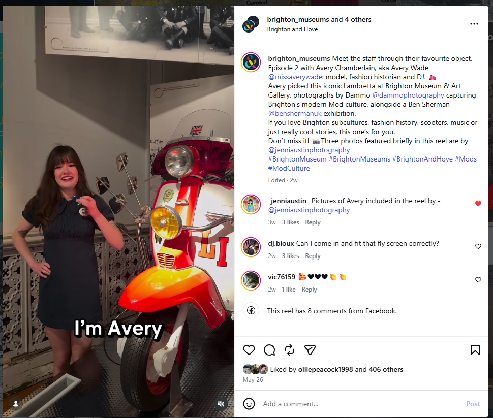 Screenshot of an Instagram reel video. Video features a woman standing in front of a Lambretta scooter with a microphone. Beside the video is the caption and hashtags.